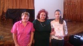 Победитель олимпиады Голяк Юлия, преподаватель Романова Е.В., заместитель директора учебно-методического центра Байкал В.П.Щукина
